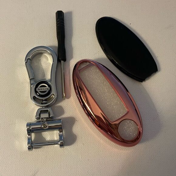 Nissan logo Key Fob Keychain in Silver and Fob Case Cover in Pink NWT - Picture 2 of 7